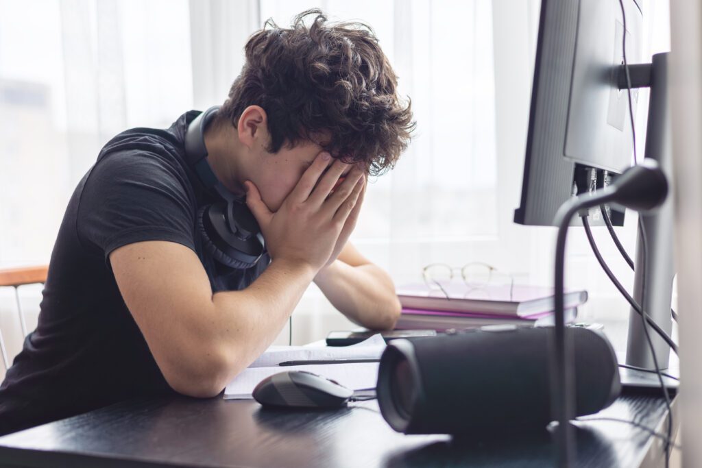 Stressed Out Student. Study Burnout. Overwhelmed. Anxiety. Mental Fatigue. onlinelearning. Overwhelmed Teenager Struggling with Studying and Exam Stress. Learning Difficulties, ADHD, Autism. Copyspace